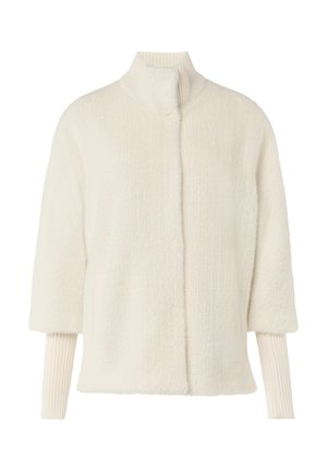 Veste texturée de couleur crème avec un col montant, des manches courtes et des poignet en côte. Tissu doux et moelleux avec un motif subtil.