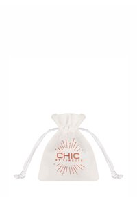 Small white drawstring pouch with "CHIC BY LIRETTE" text and decorative sunburst design in orange.