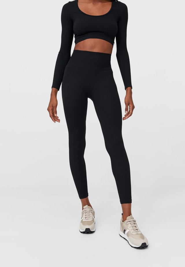 NAHTLOSE - Leggings - Hosen - black