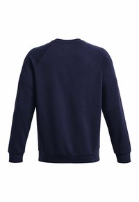 Sudadera azul marino con una textura suave, cuello redondo canalé y mangas raglán. Cuenta con dobladillos acampanados y una parte trasera sencilla y sin adornos.