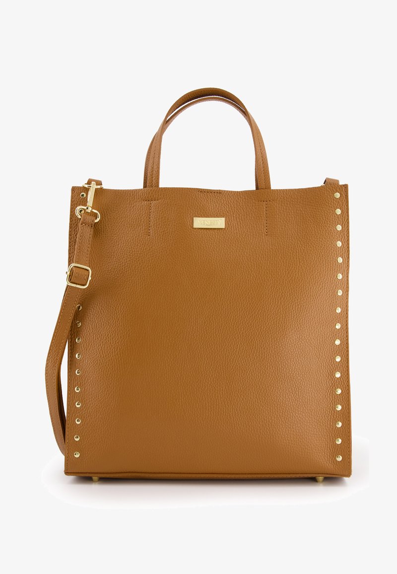 Brown leather tote bag with rounded handles, gold stud accents on one side, and a detachable shoulder strap. Smooth texture and structured shape.