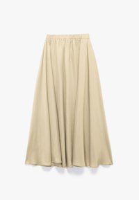 Beige, knälång kjol i lätt tyg. Har resår i midjan och diskreta veck, vilket skapar en flödande silhuett.