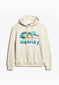 Beżowa bluza z kapturem z kieszenią typu kangur. Posiada graficzny wzór z górami, drzewami oraz napisem "Superdry" w kolorze niebieskim i zielonym.