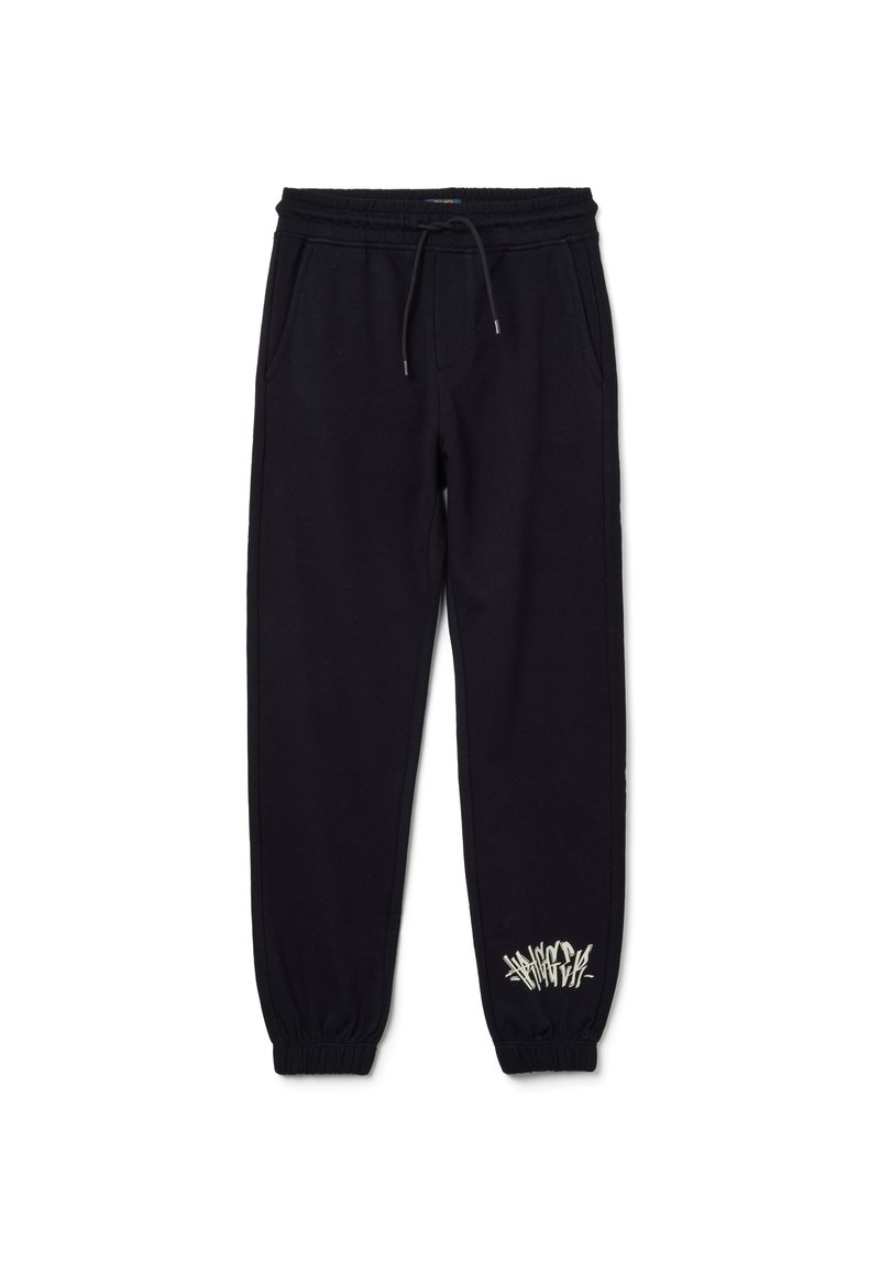 Schwarze Sweatpants mit elastischem Bund und Bündchen, Seitentaschen, Kordelzug und weißem Graffiti-Stil Druck nahe dem linken Knöchel.