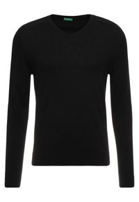 Pull noir à col en V avec manches longues, en maille lisse, présentant une coupe ajustée et des coutures discrètes aux épaules.