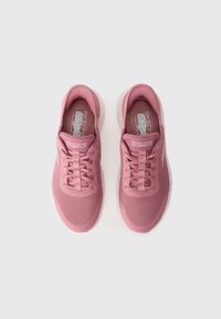 Pink athletic shoes with a breathable mesh upper, lace-up design, padded collar, and cushioned insole. Smooth rubber sole.