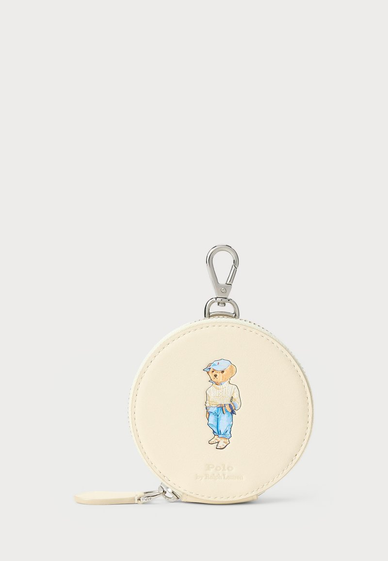 Round cream leather coin purse featuring a bear illustration in casual attire, silver clip hardware, and a zip closure.