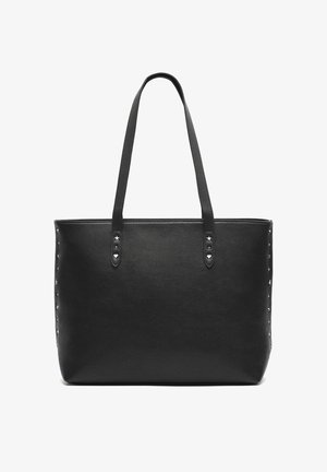 Black tote bag in synthetic leather, featuring two long handles and studded accents in star and heart shapes along the sides.