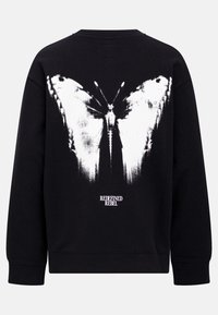 Čierna mikina s veľkým bielym motýľom na chrbte a textom "REDEFINED REBEL". Mäkká látka, rebrované manžety a výstrih.