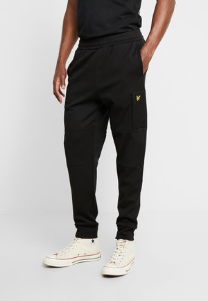 Pantalones deportivos - black