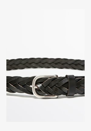 Black woven leather belt featuring a silver metallic buckle. The texture is intricate with a flat profile and an adjustable loop.