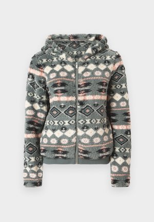 Felpa con zip in finta pelliccia grigia, con un motivo geometrico caratterizzato da accenti rosa, blu e neri. Tessuto morbido e design con cappuccio.