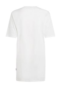 T-shirt blanc uni à manches courtes vu de dos avec une petite étiquette en tissu en bas à gauche.