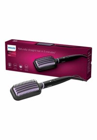 Zwarte verwarmde steeltang met paarse accenten, met een rechthoofdige kop, fijne haren en een ergonomische handgreep, naast een productdoos.