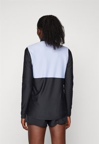 Under Armour TRACK JACKET - Jakna za treniranje - black/celeste