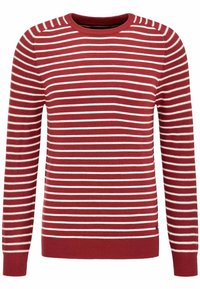 Maglione a righe rosse e bianche con maniche lunghe, scollo rotondo e polsini e orlo a coste. Tessuto morbido con righe uniformi.