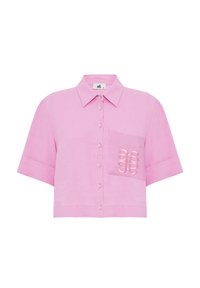 Camicetta rosa a maniche corte in lino, con chiusura a bottoni, colletto a punta e tasca con ricami decorativi.