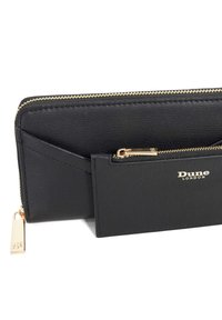Black leather wallet with a textured finish, gold zipper, and a separate cardholder featuring the "Dune London" logo.