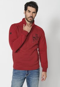 Koroshi Melegítőfelső - rojo red