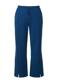 Blaue Jogginghosen mit einem elastischen Bund, Kordelzug und seitlichen Schlitzen. Mit kontrastierendem schwarzen Paspel entlang der Nähte.