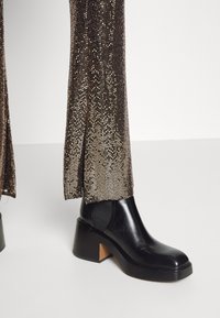 Maje Broek - gold-coloured