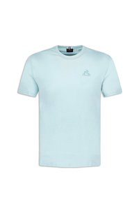 Světle modré bavlněné tričko s kulatým výstřihem a krátkými rukávy, se subtilním logem v levém prsním prostoru. Hladká textura.