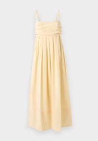 Abito lungo di un delicato giallo, con spalline sottili, corpetto arricciato e gonna plissettata per un volume testurizzato. Tessuto morbido con una finitura liscia.