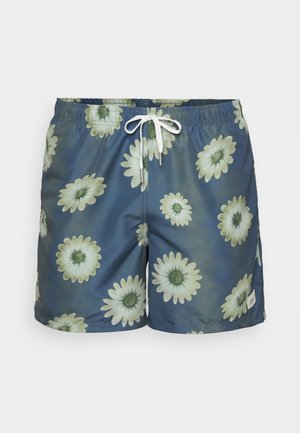 Herre svømmebukser i blå med et tusindfryd blomsterprint. Har elastisk talje, snørelukning og et glat, let stof.