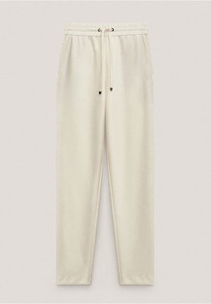 Roomkleurige taps toelopende sweatpants met een elastische tailleband en trekkoord, voorzien van zijzakken en een gladde stoftextuur.
