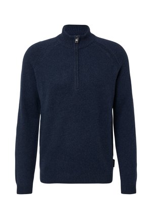 Jūras spēku zils adīts puloveris ar augstu apkakli, priekšējo rāvējslēdzēju un ribotu piedurkņu un apakšmalu. Iezīmējas ar raglanu piedurknēm un strukturētu apdari.