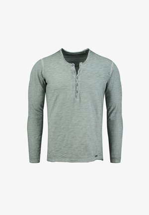 Langarm henley-shirt in lichtgrijs, gemaakt van zachte stof. Beschikt over een drukknoopsluiting en een ronde halslijn met contrasterende stiksels.