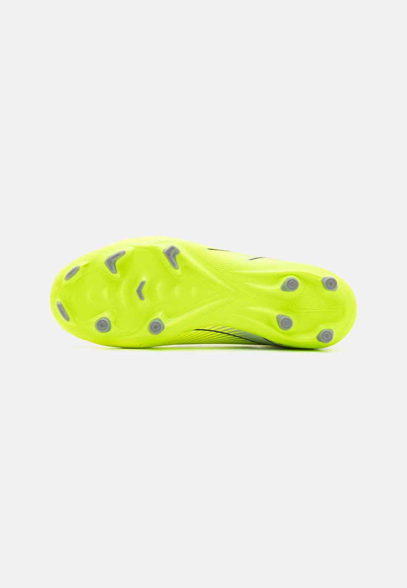 Nike-Sprint-Schuhsohle in hellem Neon-Gelb mit grauen Traktionsstollen, die eine strukturierte Oberfläche und ein aerodynamisches Design aufweist.