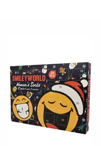 Calendario di calze da donna SmileyWorld, composto da 12 paia, design della scatola con motivi festivi, colori vivaci e grafiche giocose. Taglia 35-41.