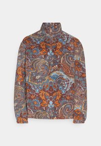 Felpa in tessuto morbido con motivo paisley. La combinazione di colori include marrone, blu e arancione. Presenta una zip a metà e colletto rialzato.