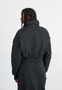 Nike Sportswear REPEL ZIP - Bomber Jacket - black
