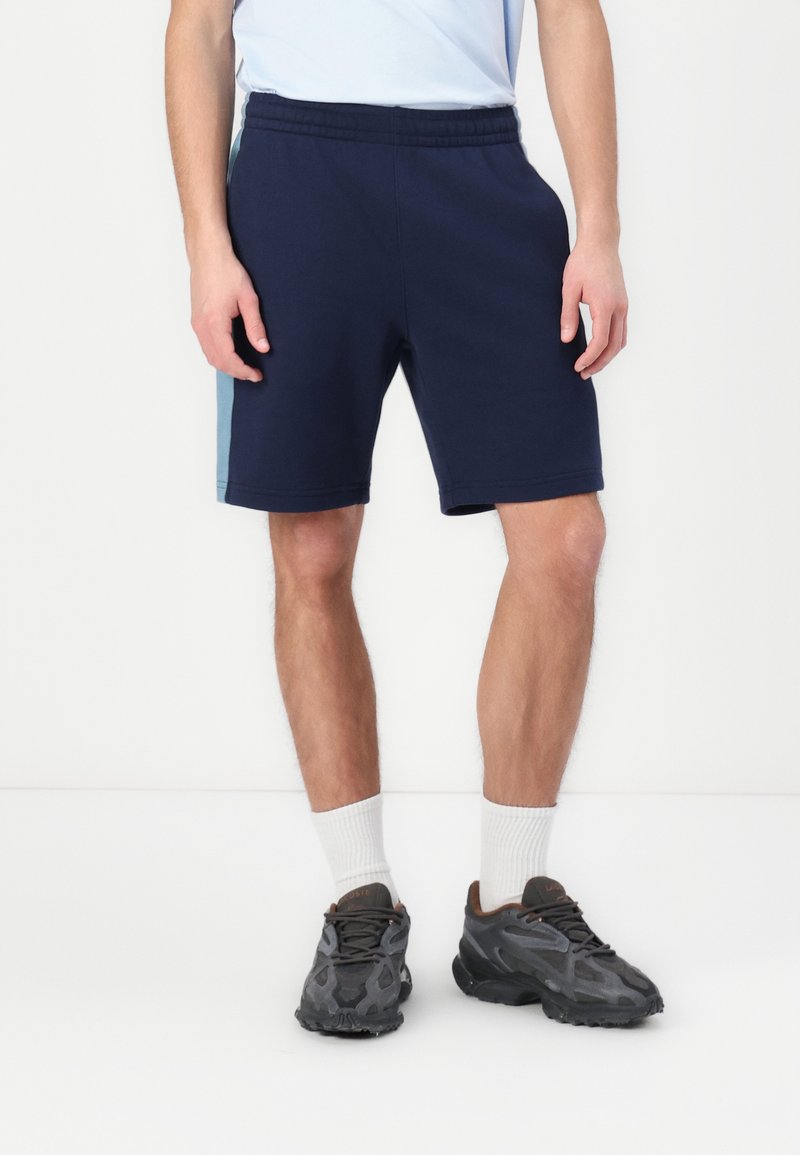 Lacoste - Pantaloni de trening - navy blue/limestone, Extindeți