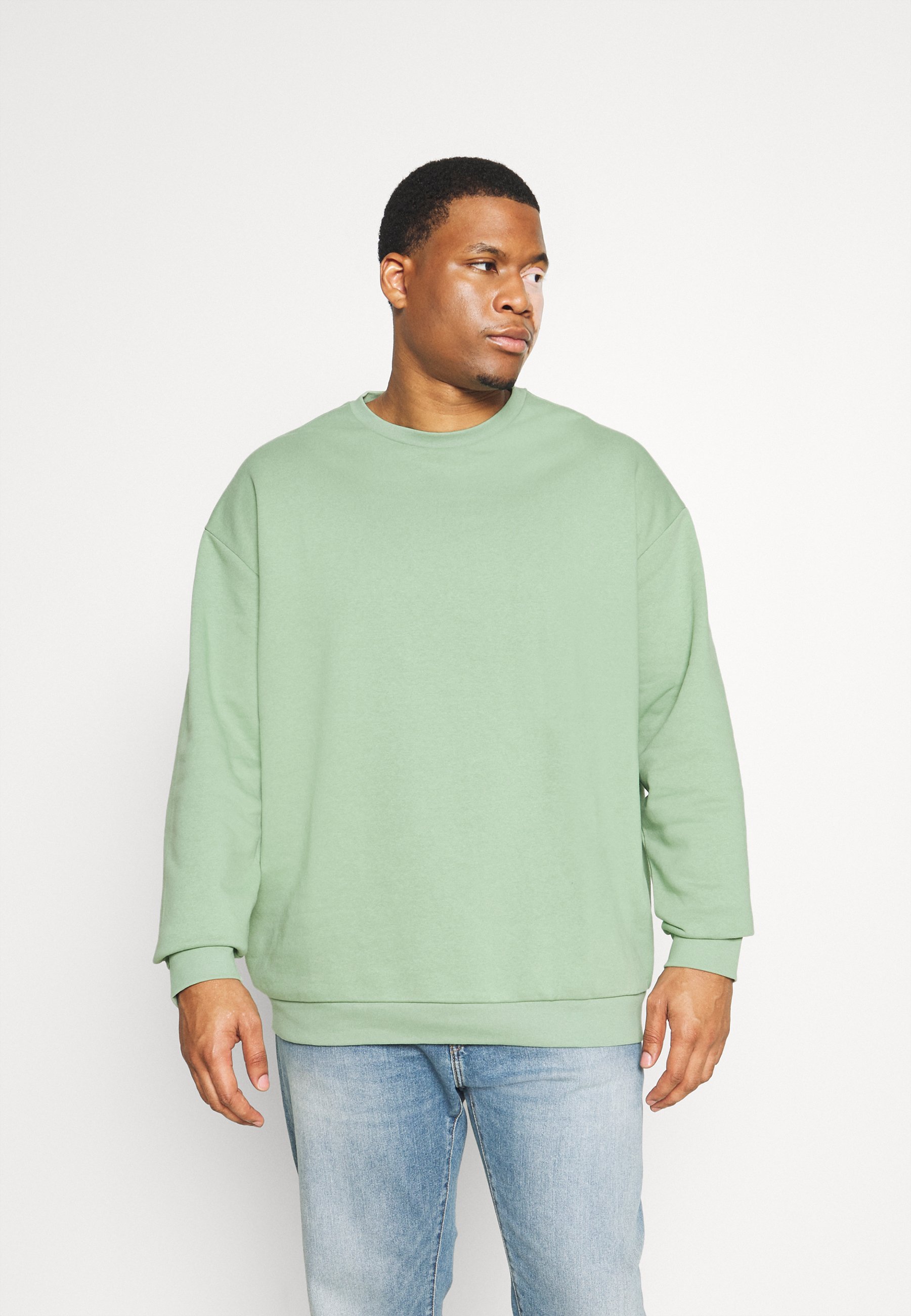 dark green sweater