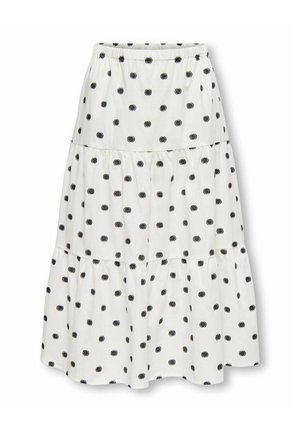 Hvit lagdelt skjørt med svarte polkadotter, elastisk midjebånd og et flytende, samlet design.