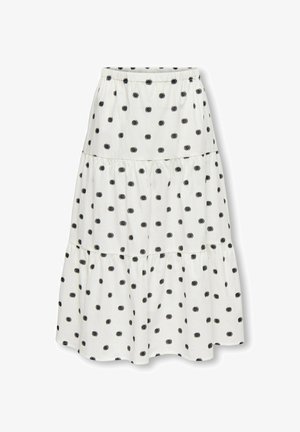 Hvid lagdelt nederdel med sorte polkaprikker, elastisk talje og et flydende, samlet design.
