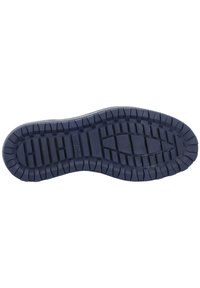 Navy rubber shoe sole featuring a textured design with deep treads for traction. Includes a manufacturer label near the heel area.