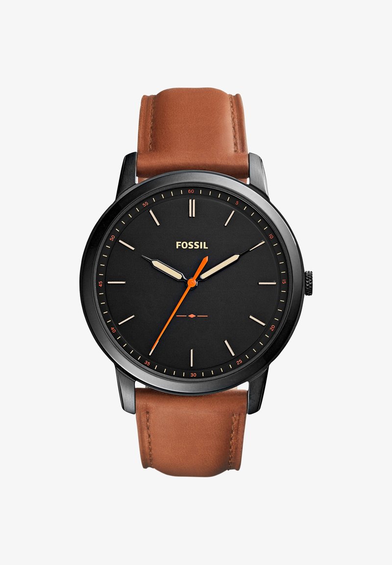 Montre-bracelet Fossil à cadran noir avec bracelet en cuir beige, index horaires minimalistes et aiguille des secondes orange indiquant 10:10:35.