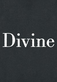 Tissu noir avec un texte blanc lisant "Divin". Les lettres sont en gras, avec une apparence légèrement texturée contre le fond lisse.
