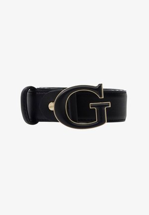 Cinturón de cuero negro con una gran hebilla "G" en negro y dorado, y pequeña marca "Guess" en el lateral.