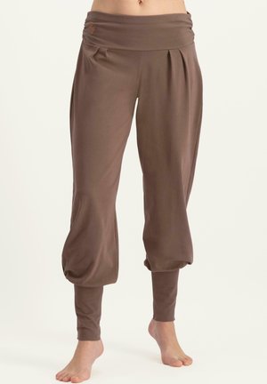 DAKINI - Tracksuit bottoms - clay