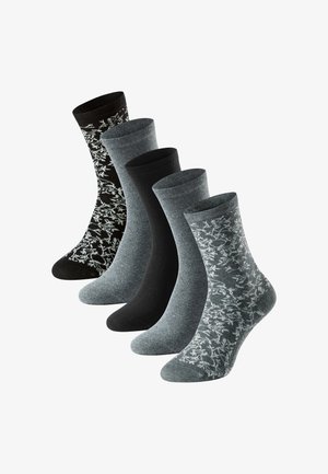 Five pairs of mid-calf socks in black, gray, and patterned gray and black arranged in a staggered row on white background.