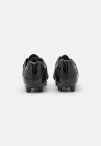 Joma AGUILA - Scarpe da calcio per terreni duri - black