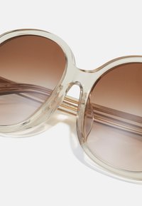 COACH Occhiali da sole - transparent fawn