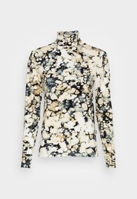 Langermige turtleneck top van een zachte, rekbare stof met een abstract patroon in zwart, crèmekleur en beige, met subtiele textuurvariaties.