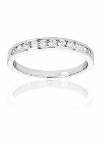White gold ring with a straight, polished band featuring a row of ten round cubic zirconia stones embedded on the top surface.