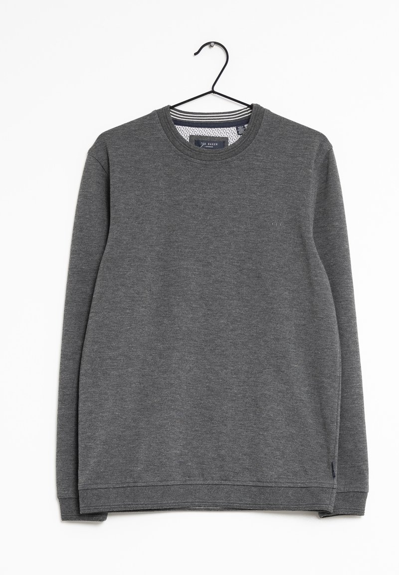 Sweat-shirt gris foncé à manches longues avec col rond, suspendu à un cintre noir sur fond blanc.
